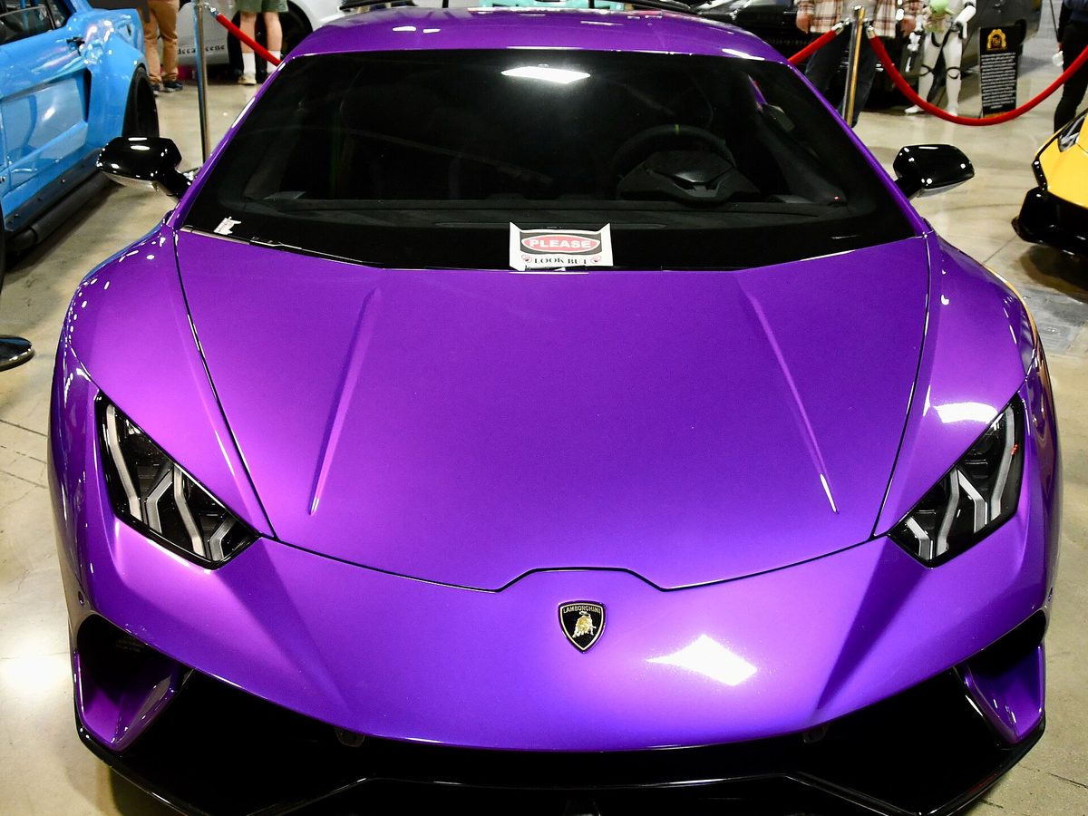 Front view of a gloss purple wrapped Lamborghini Huracán