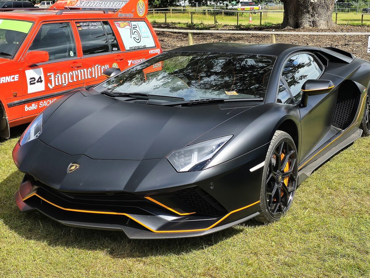 Matte black Lamborghini Aventador with contrasting accent stripes
